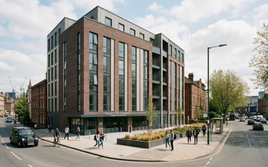 A modern, purpose-built student accommodation building in a UK city, featuring large windows and contemporary architecture under a clear sky.