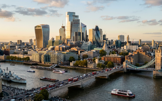 The iconic skyline of the City of London financial district with modern skyscrapers under a clear sky, symbolising investment and finance.