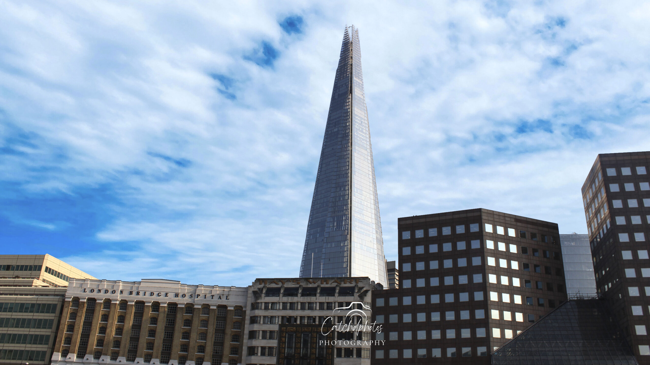 A modern London city skyline at dusk, with sleek glass buildings reflecting the remaining light, illustrating the UK business landscape.