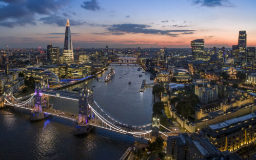 Modern financial district skyline in London at dusk, representing investment and wealth.