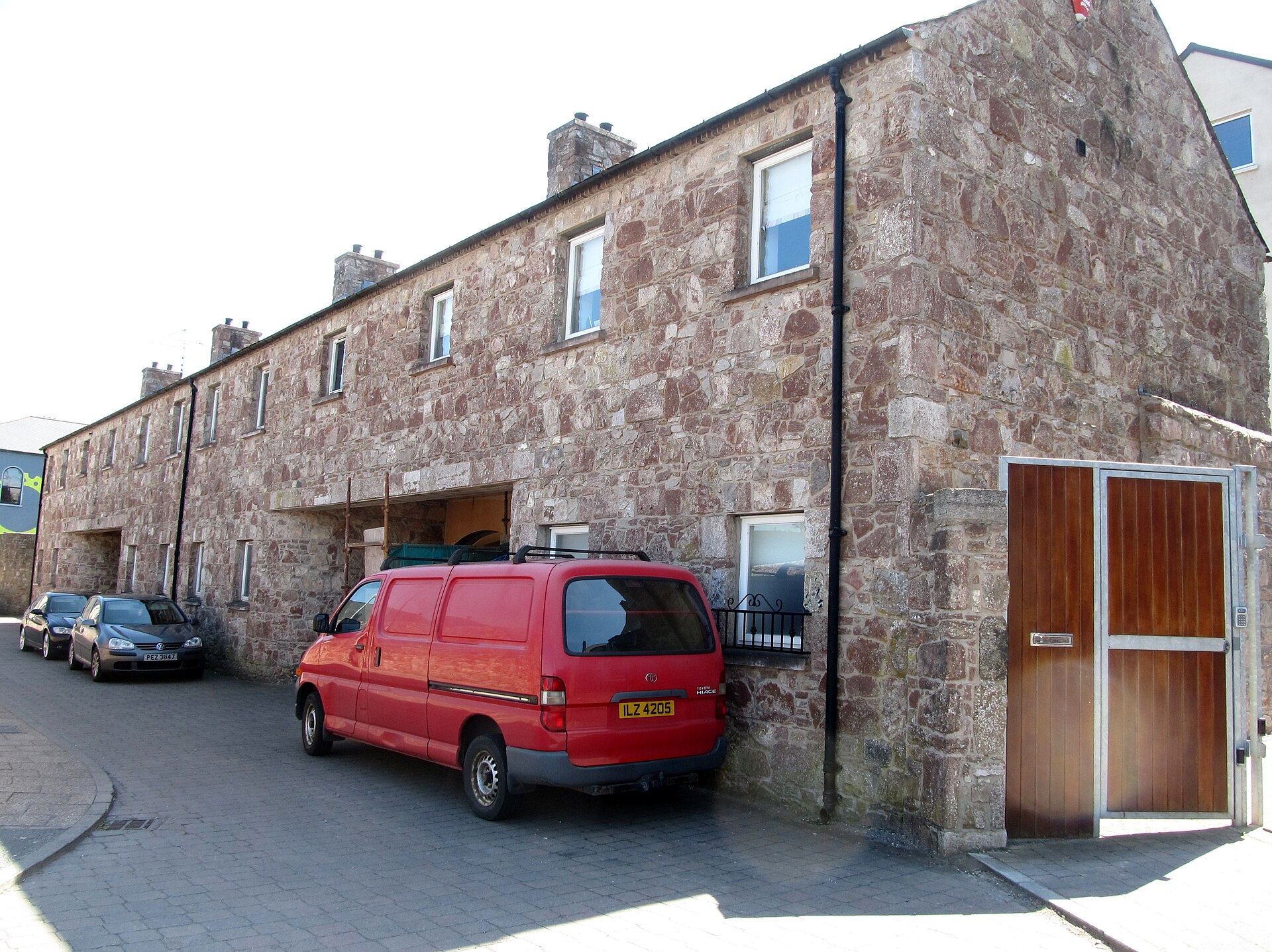 Renovation work underway at a row of UK terraced houses