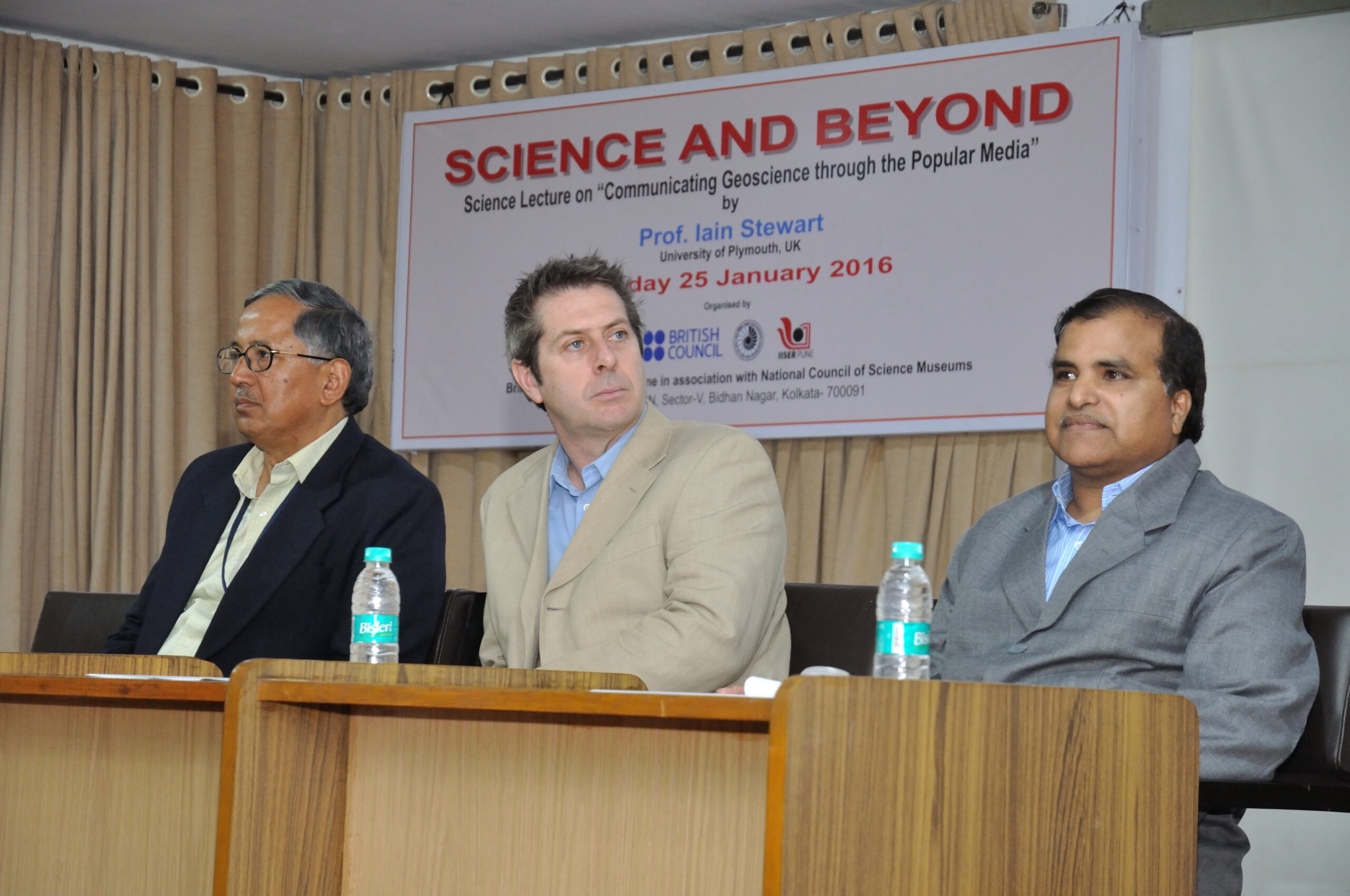 Researchers and visitors outside a university research campus