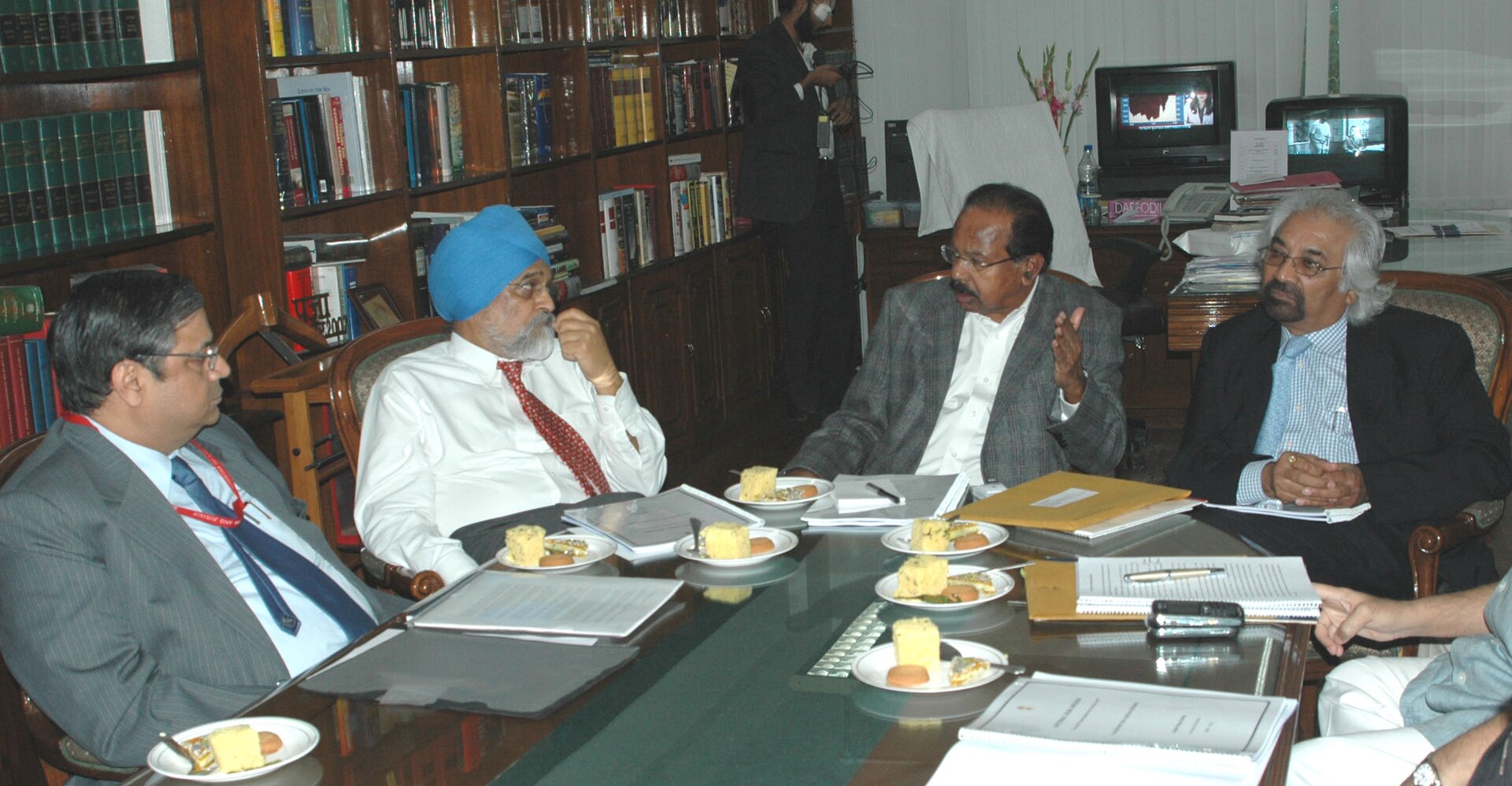 Solicitor reviewing property purchase documents at a desk