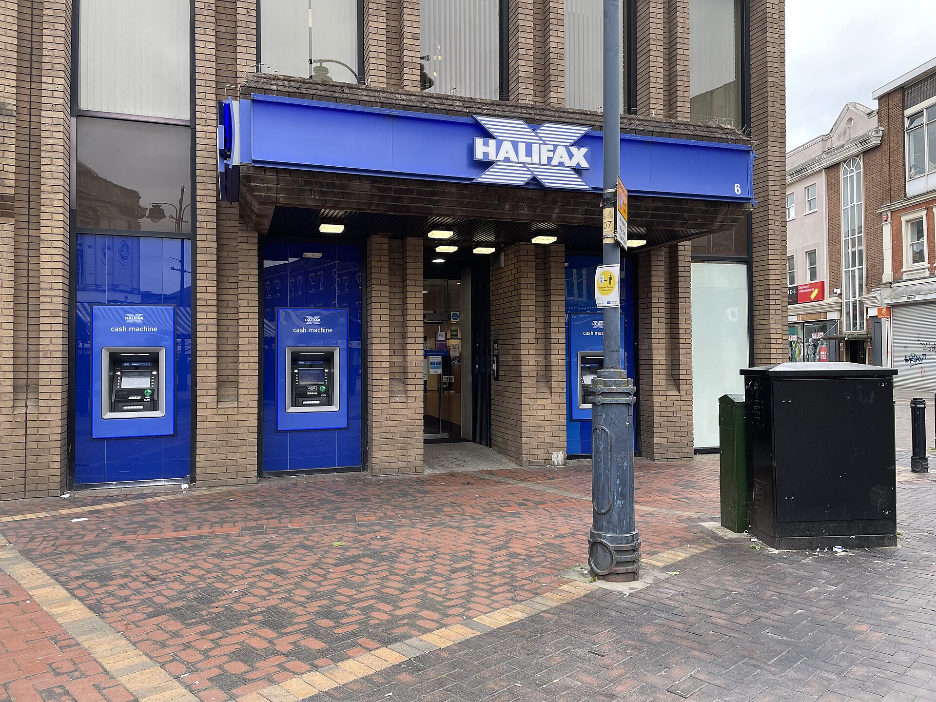 High-street bank branch on a busy UK town centre street