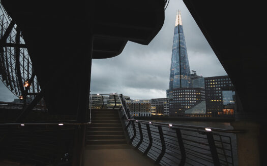 View across the City of London skyline with modern office towers at dusk