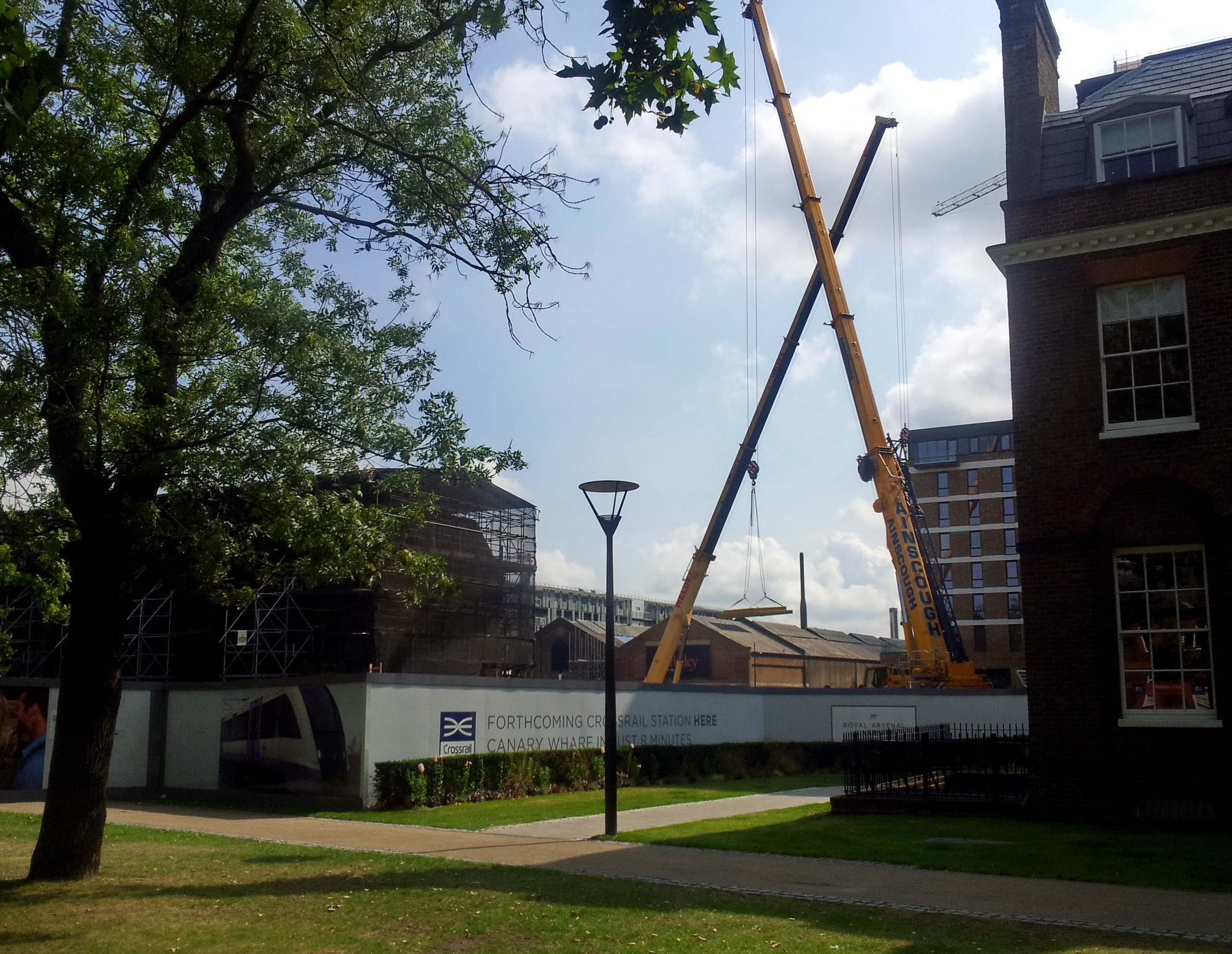 Construction cranes above office developments in central London