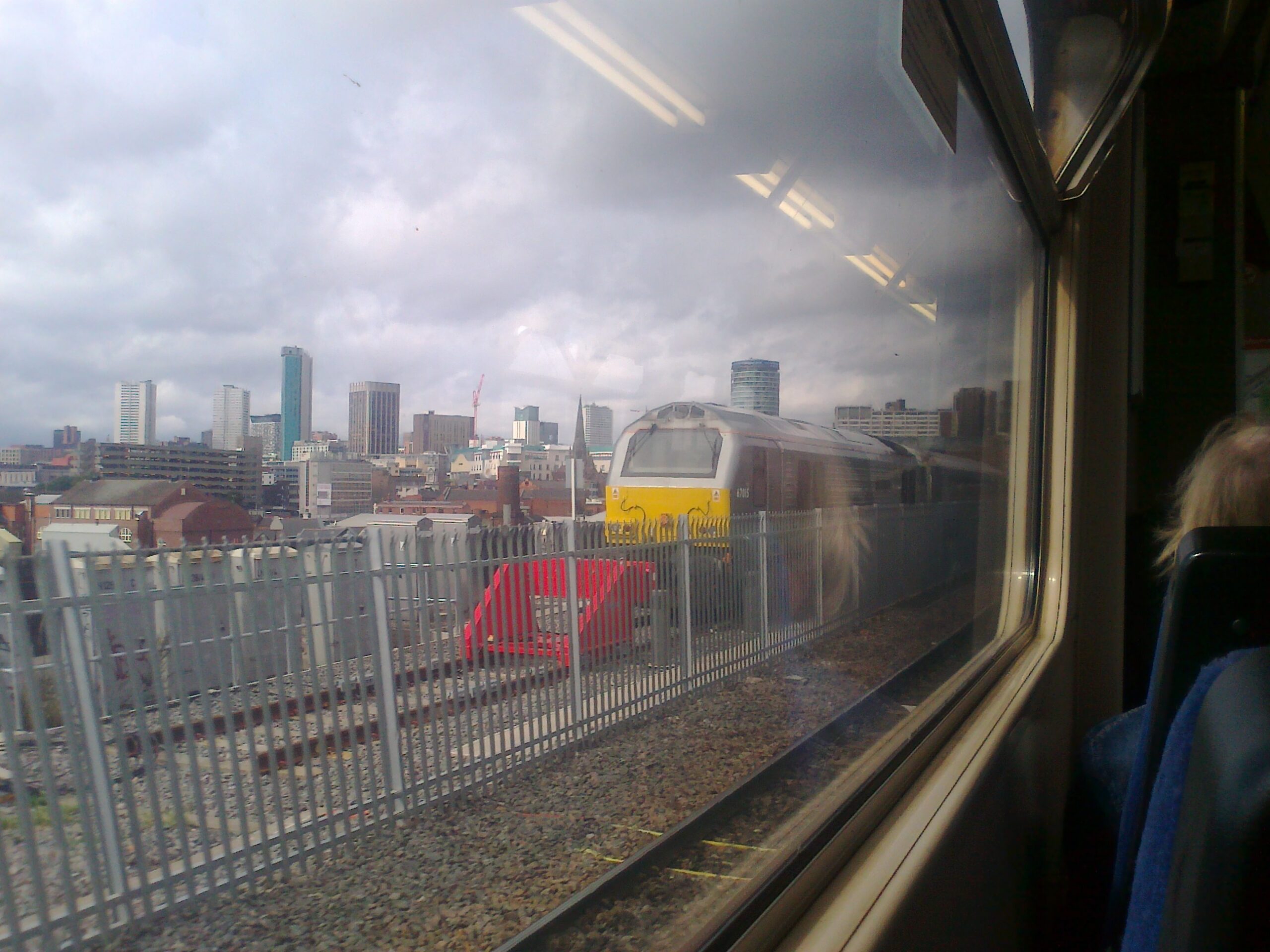 Contemporary London residential towers beside established city buildings