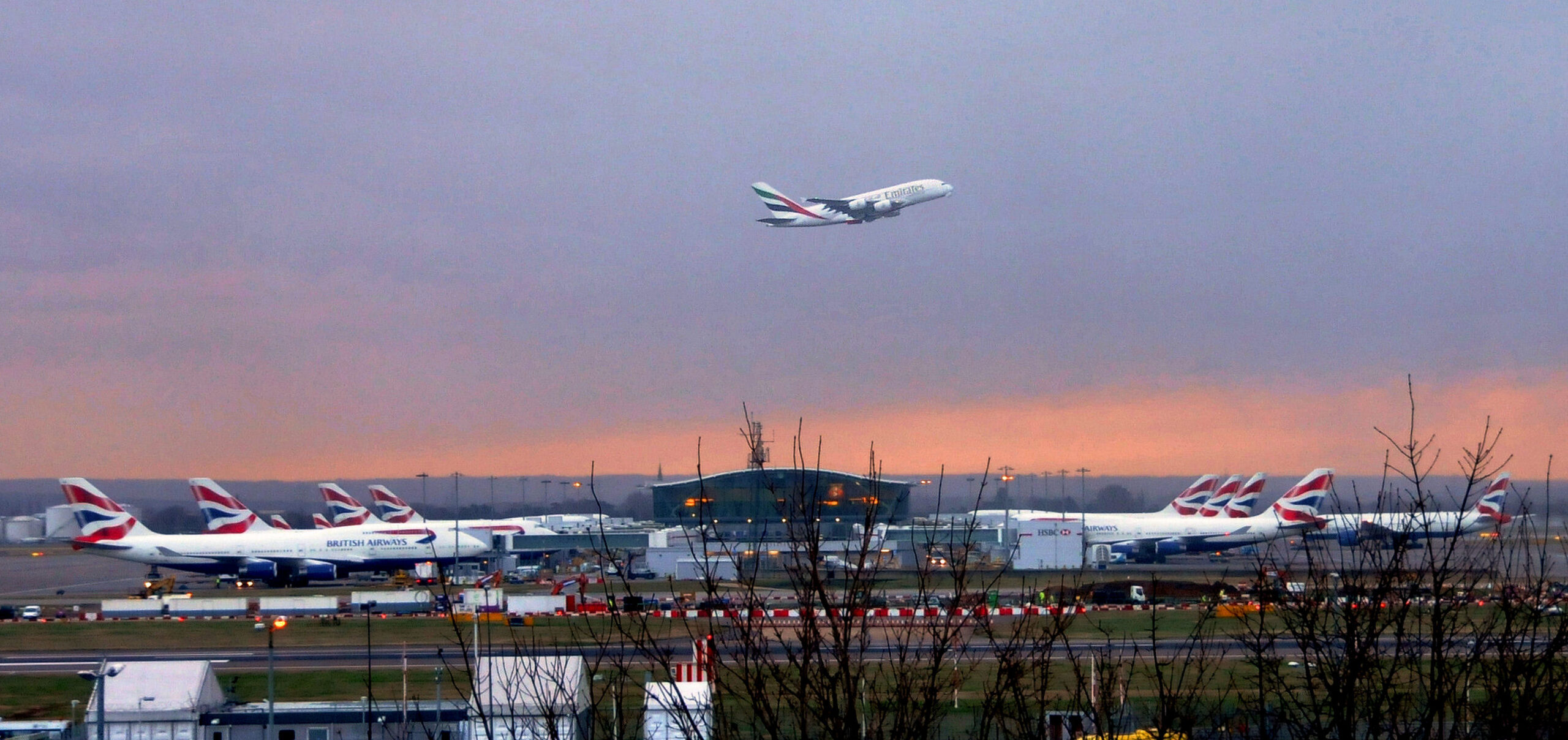 Airport departures area suggesting travel between the Gulf and the United Kingdom
