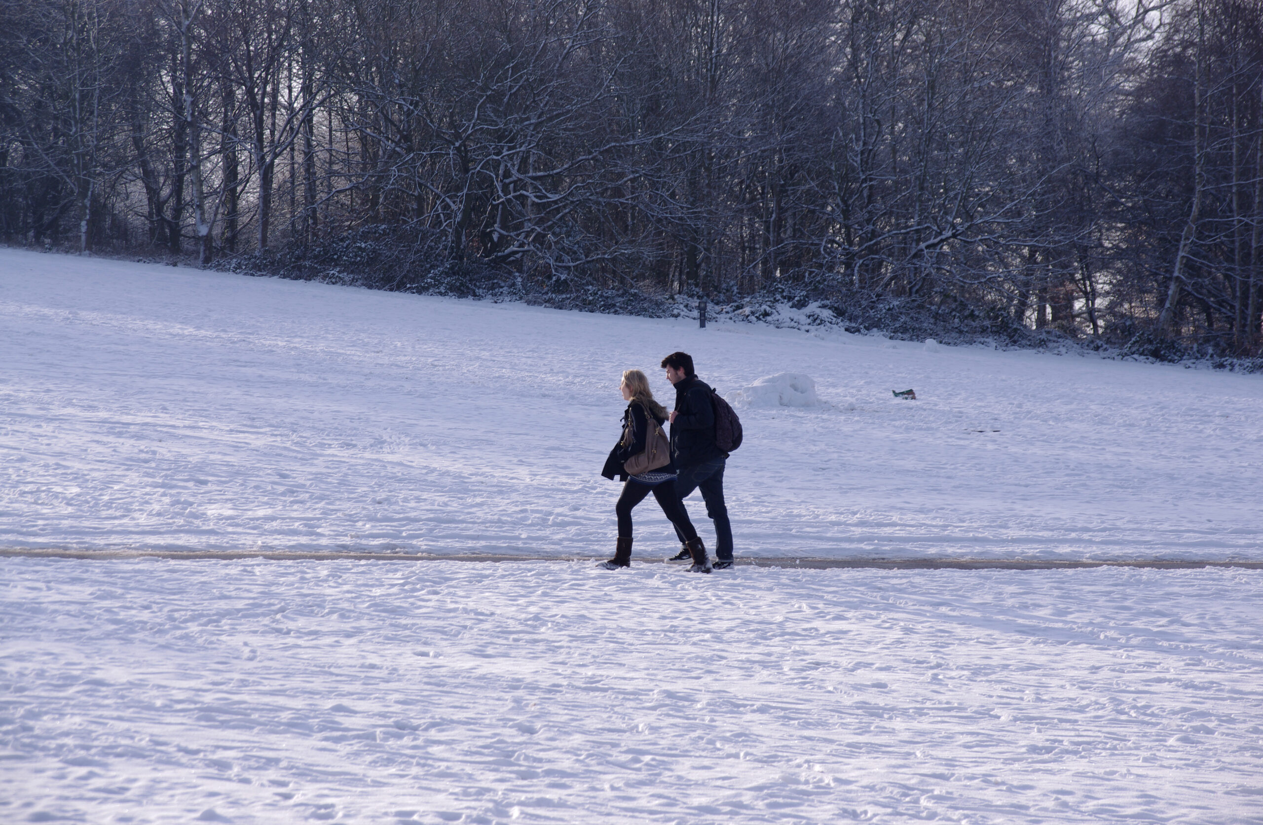 Students walking across a Nottingham university campus
